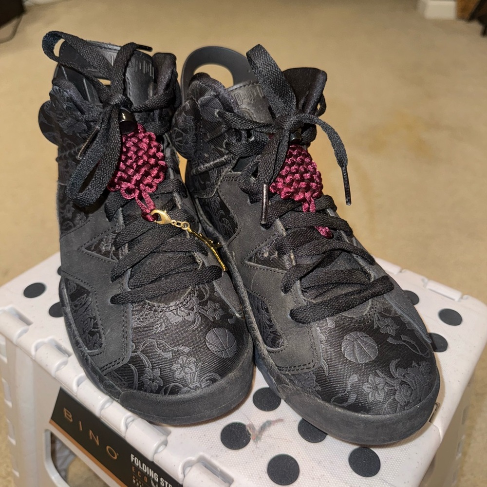 Women’s black floral-basketball print Jordan high tops